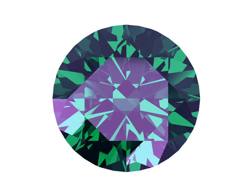 A stunning alexandrite gemstone reflecting green 